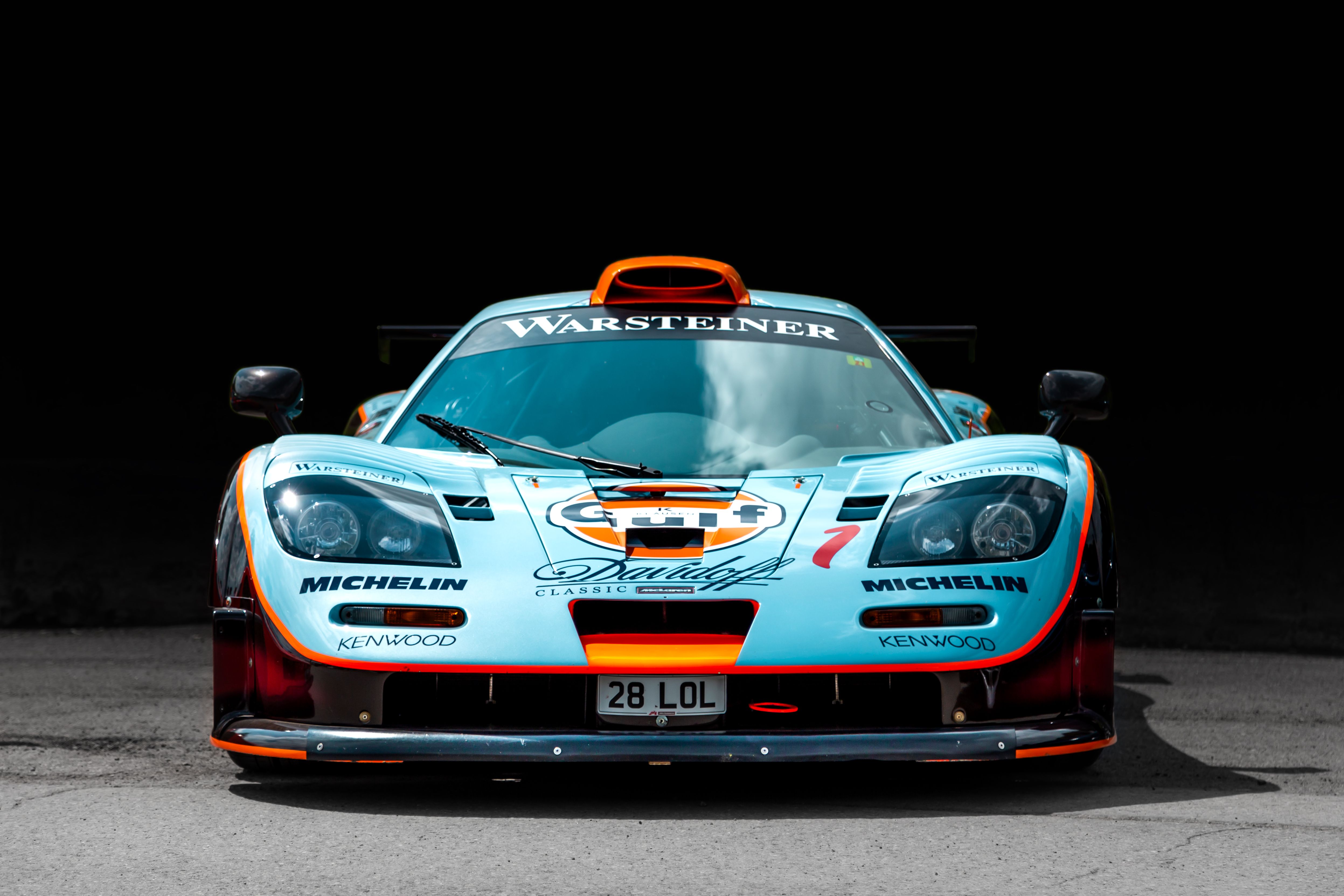 McLaren F1 GTR in Gulf livery, front view against a dark background